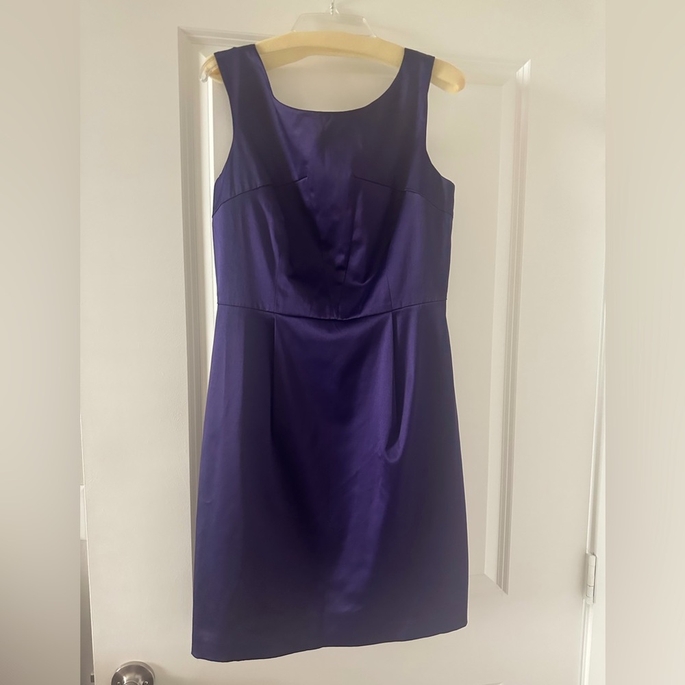 Club Monaco size 4 sleeveless dress with open back.